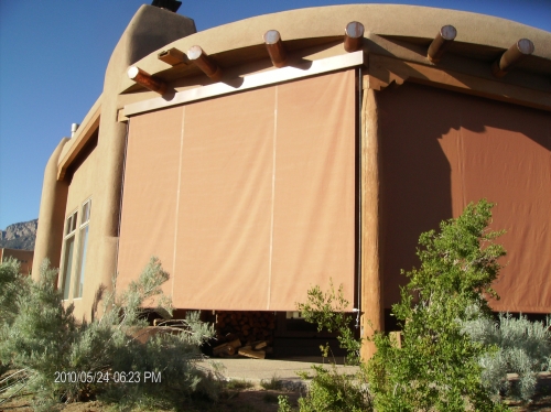 Vertical Roll Curtain with exterior hood and side cables - Rader Awning