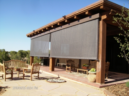 Vertical Roll Curtain with exterior hood and side rods - Rader Awning